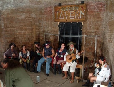 The Bone Island Buccaneers sing in the tavern