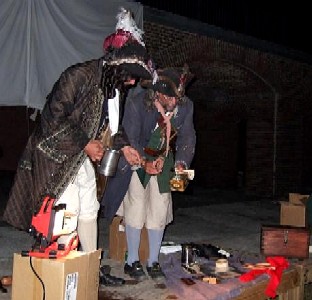 Captain Jim & the Viceroy examine an auction item