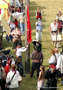 The pirate flag ascends the mast.