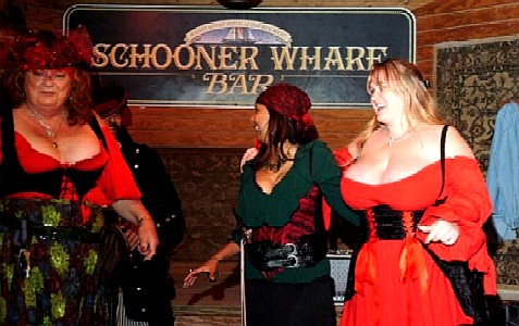 Three women competing for the Buxom Prize