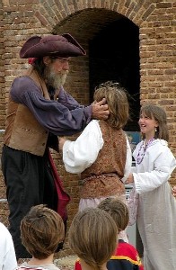 Portside Tom grabbing Youngblood's ears