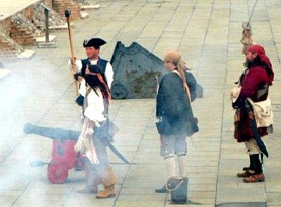 M.A. d'Dogges cannon crew firing their gun