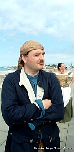 Mission with his arms crossed