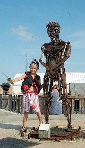 Kid with statue on fort wall