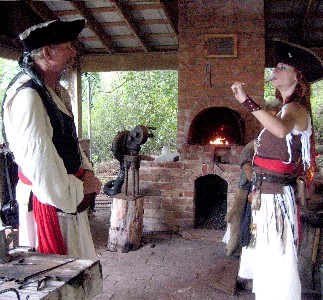 Scarlett shows Wasabe her work in the forge