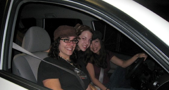 The twins and Nelly in their van