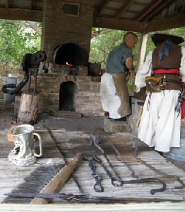 Leatherback and Scarlett at the forge