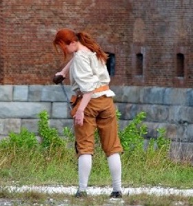 Red Jessi sheathes her sword