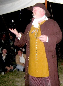 William auctioning an onion bottle