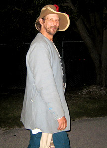 Patrick Hand walking at night