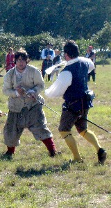 Jack Roberts and Cran Sword fighting