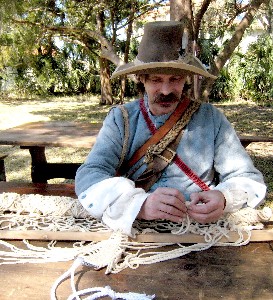 Patrick knotting his hammock