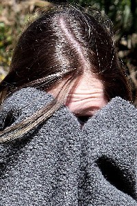 Girl hiding her face