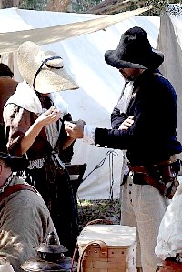 Kelly and Ivan making the drawstring