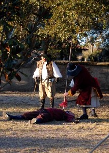 Sgt. Jeff checking a dead Spaniard