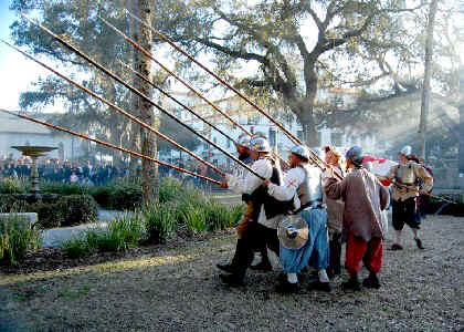 Pikesmen with their pikes at the ready on the right