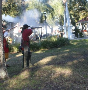 Spanish fire their weapons at the bucaneers