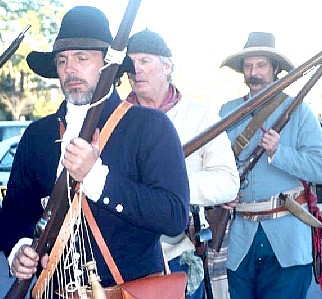 Riflemen marching into battle
