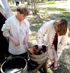 William and Youngblood washing dishes