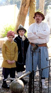 A man and his sons at the battle plan meeting