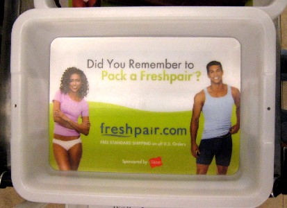 The bottom of the airport tray advertisment