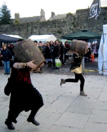 Women running with Barrels